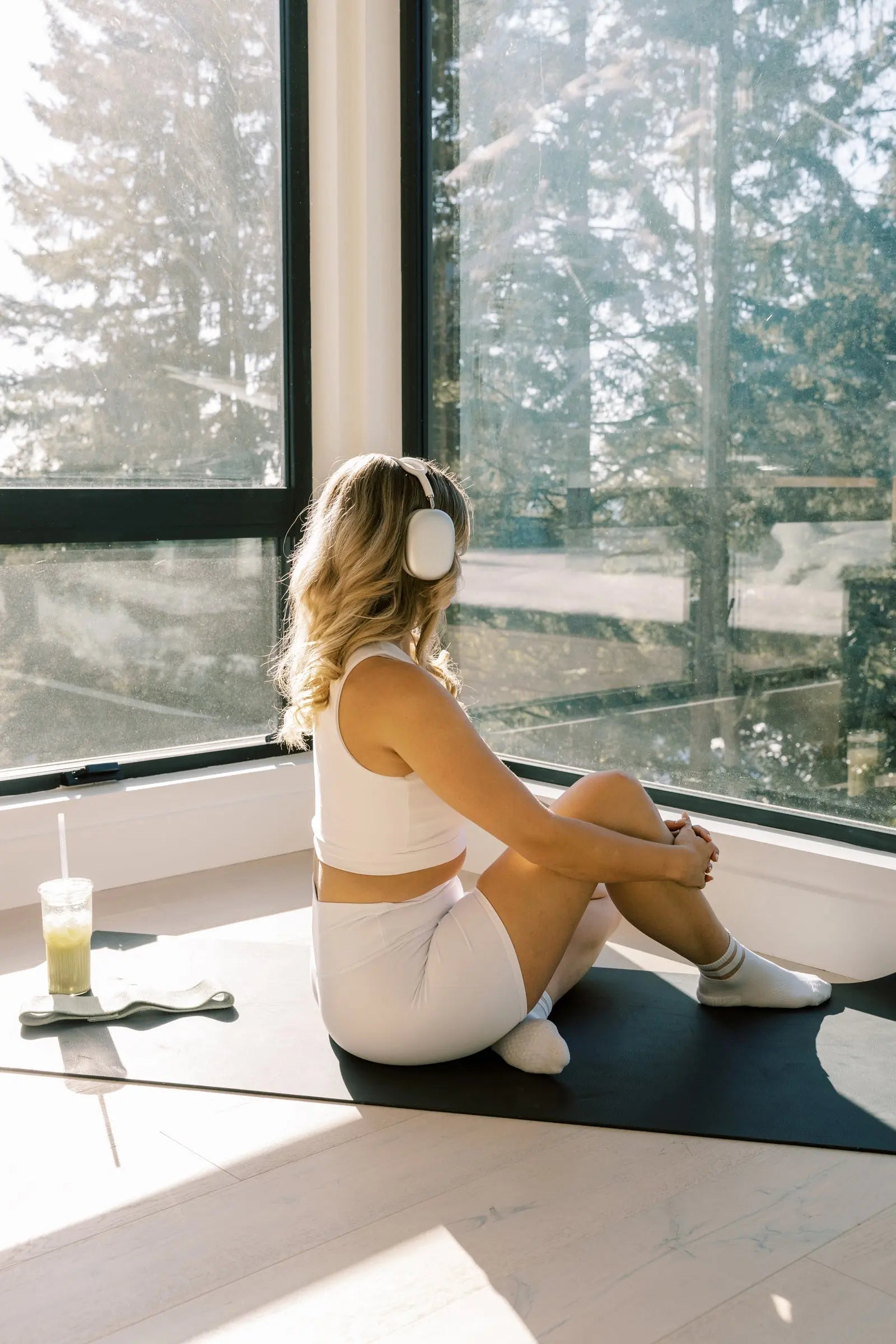 woman sitting on grounding mat