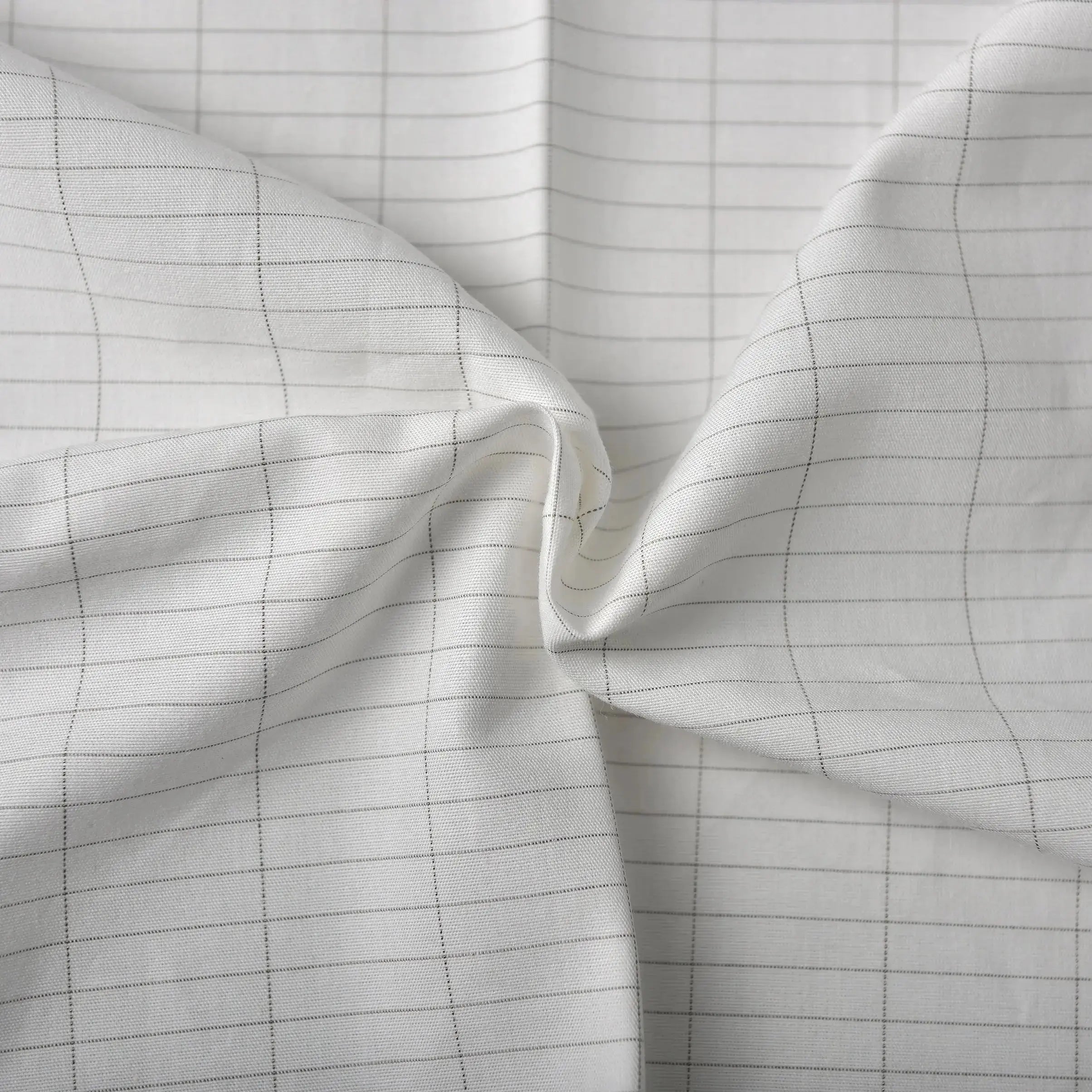 White grounding sheet stitched fabric closeup