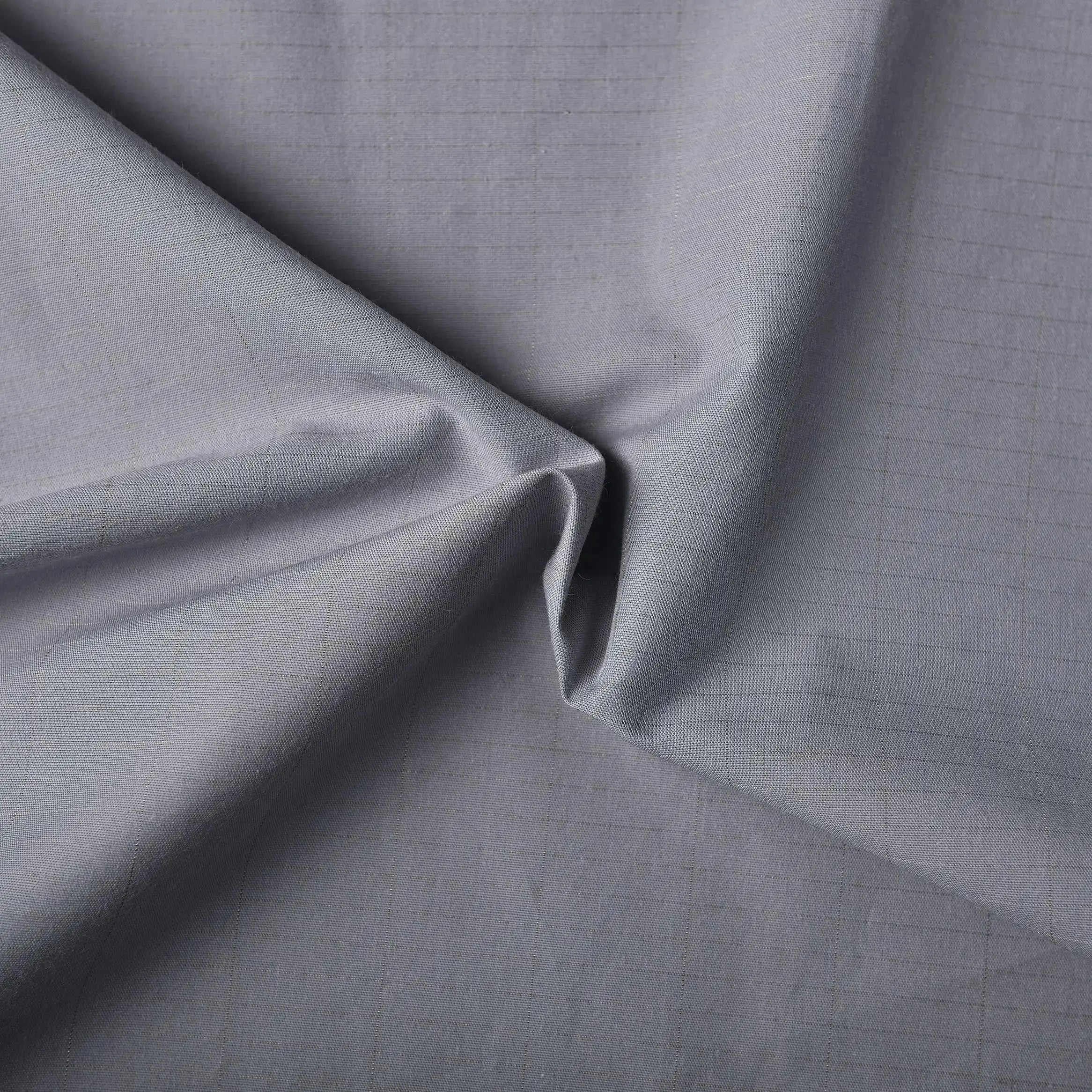 Gray grounding fabric closeup swirl texture