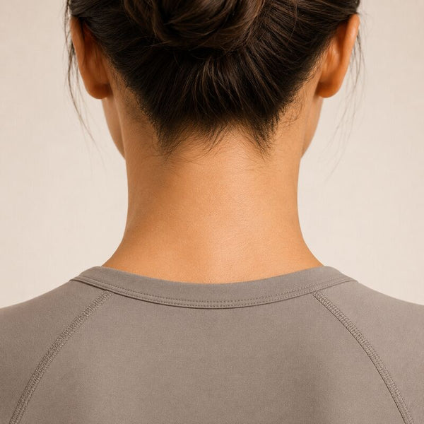 Neck contact zone — direct grounding contact during sleep